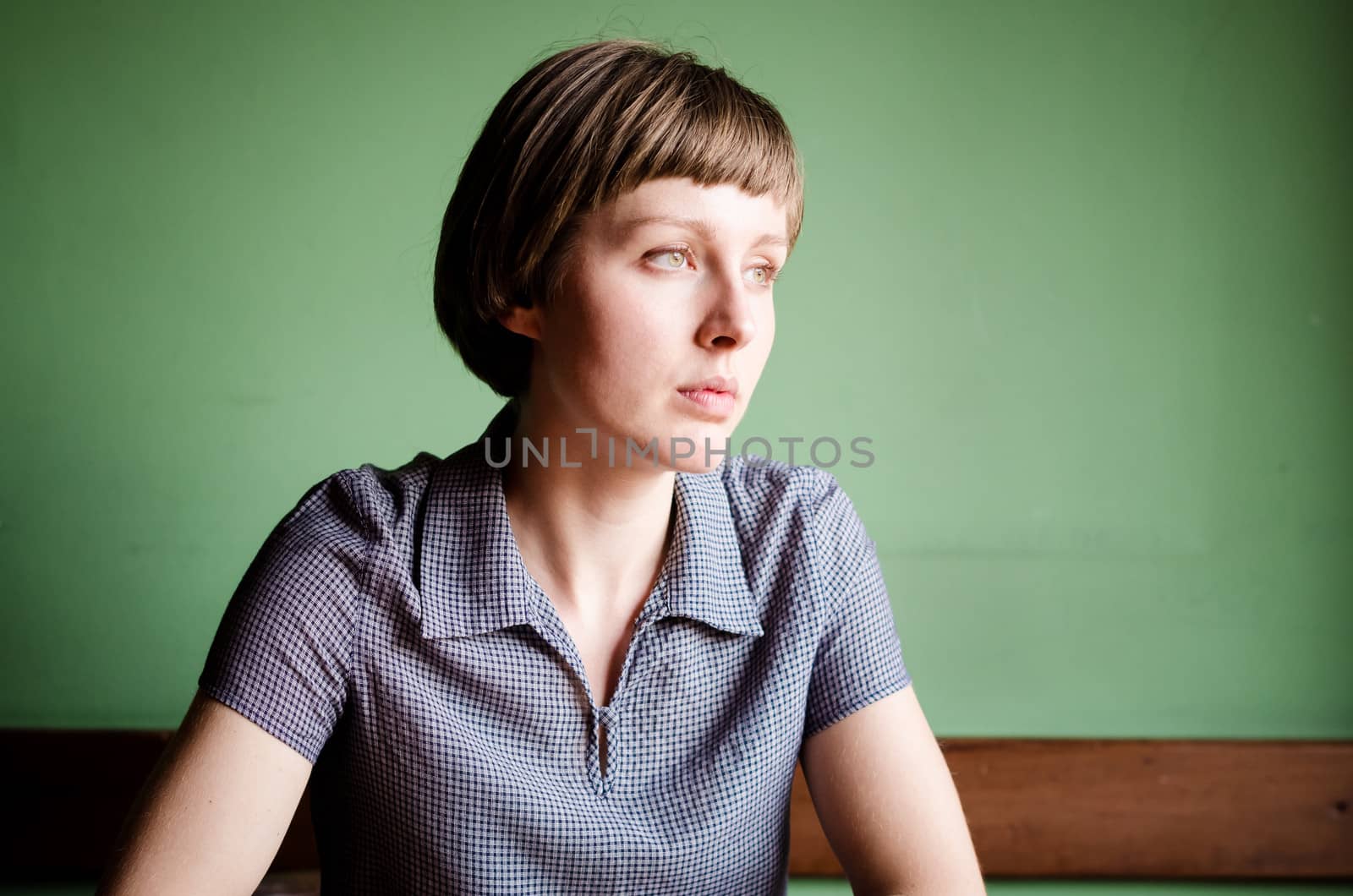 young beautiful hipster woman at the bar