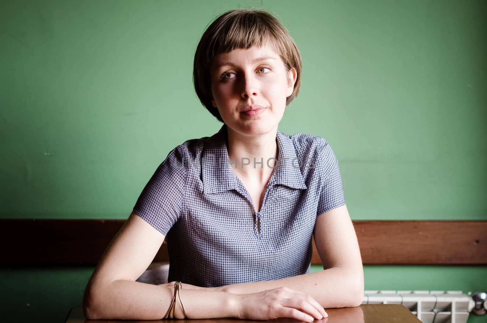 young beautiful hipster woman at the bar