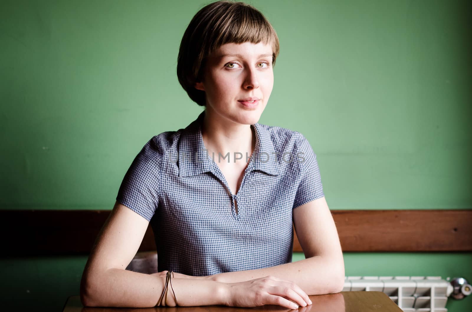 young beautiful hipster woman at the bar