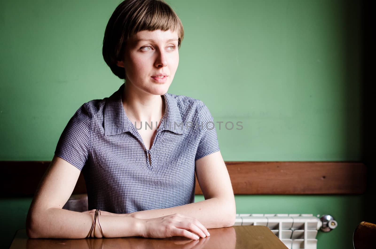 young beautiful hipster woman at the bar