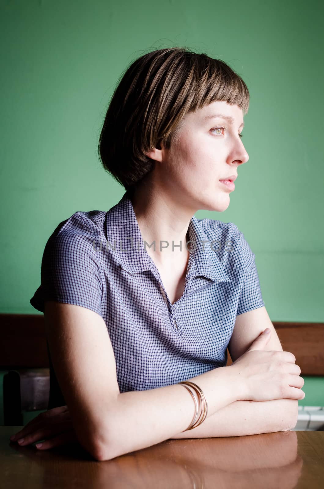 young beautiful hipster woman at the bar