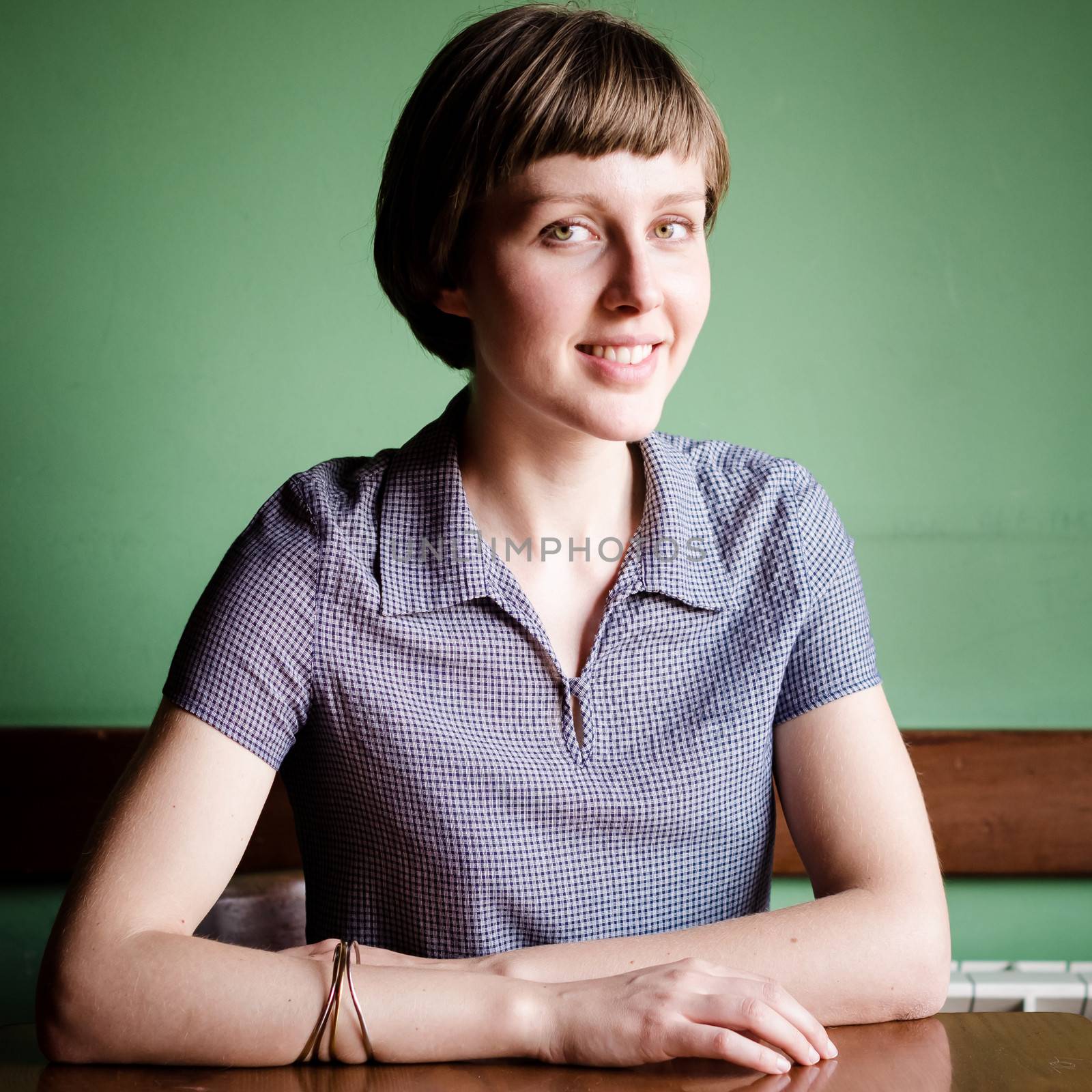 young beautiful hipster woman at the bar