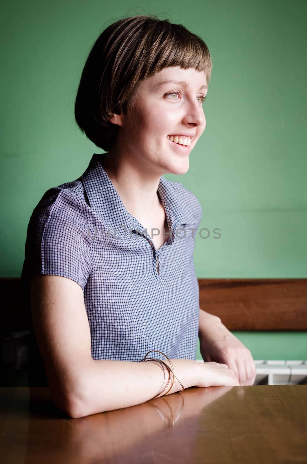 young beautiful hipster woman at the bar