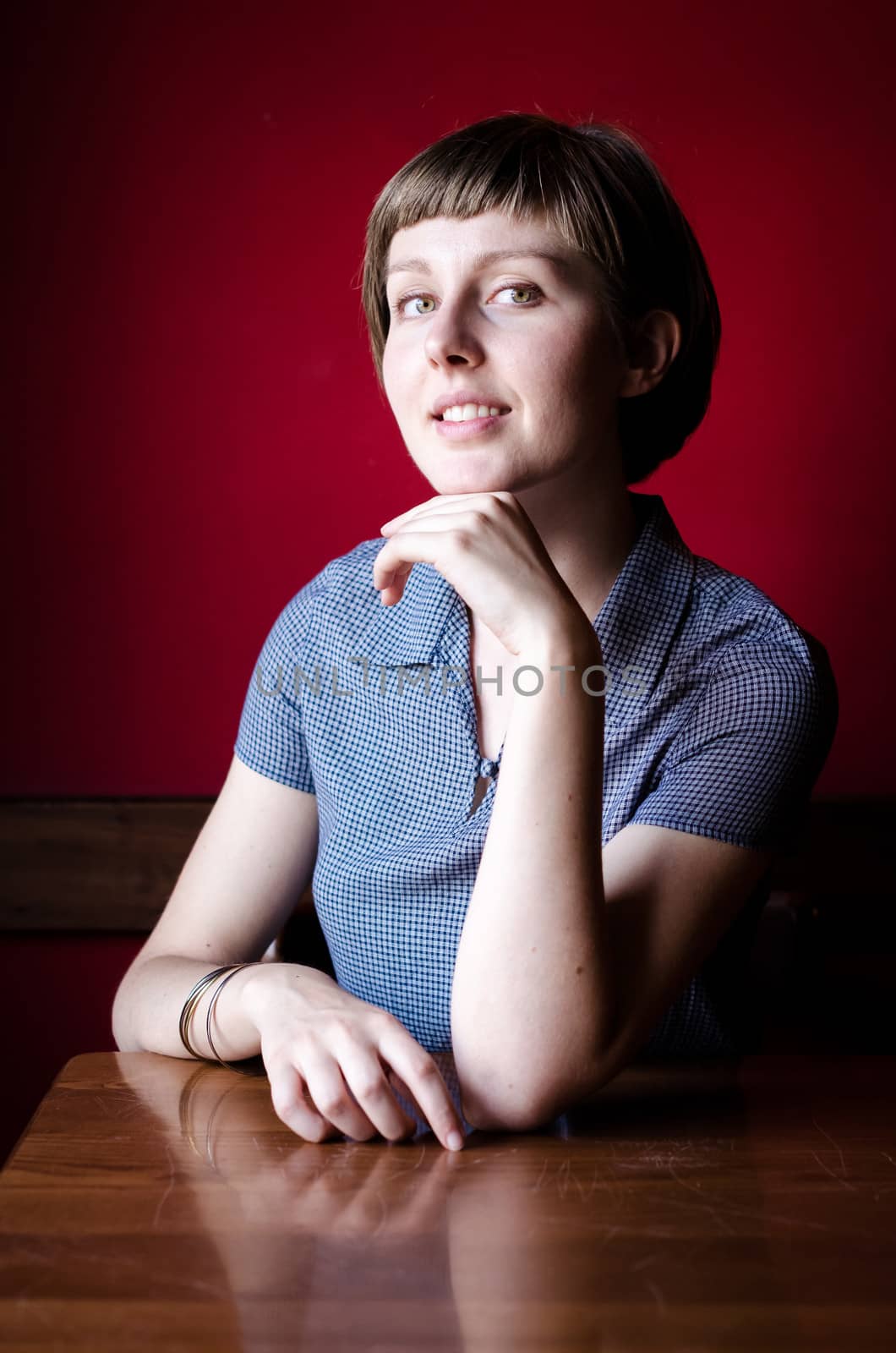 young beautiful hipster woman at the bar