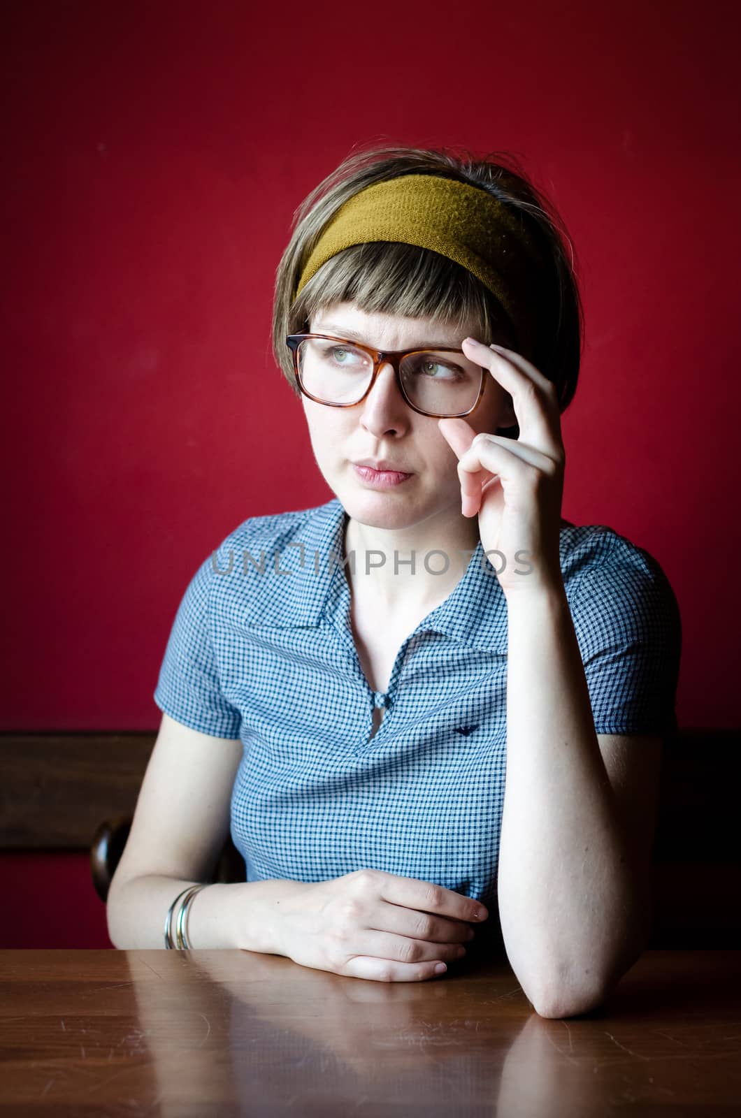 young beautiful hipster woman at the bar
