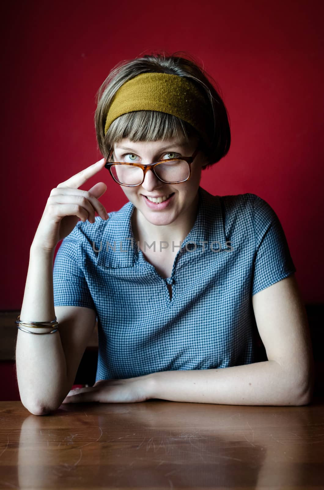 young beautiful hipster woman at the bar