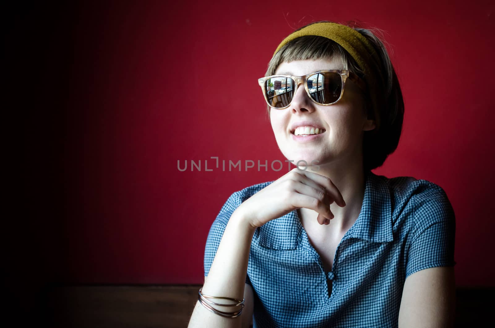 young beautiful hipster woman at the bar