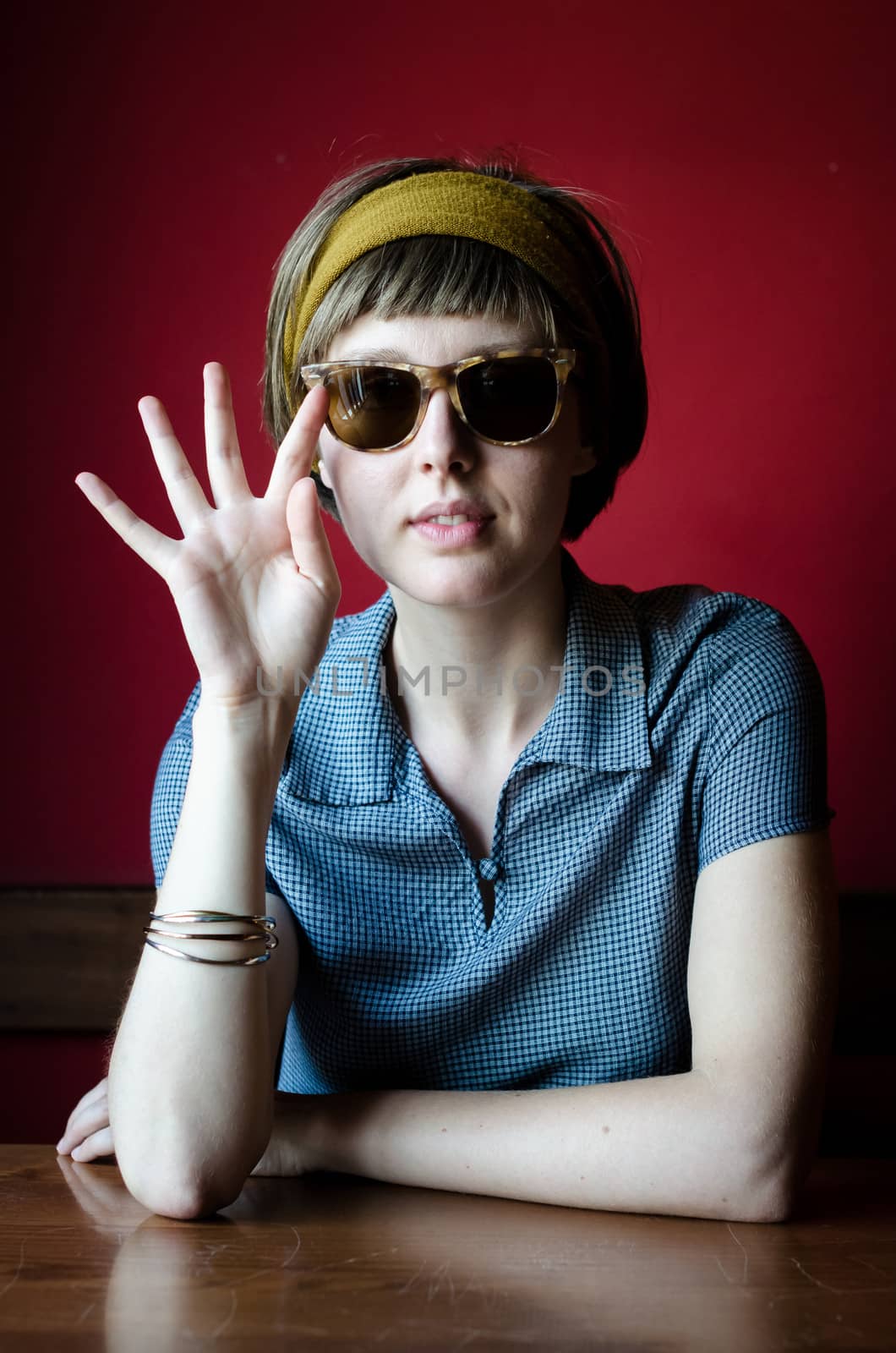 young beautiful hipster woman at the bar