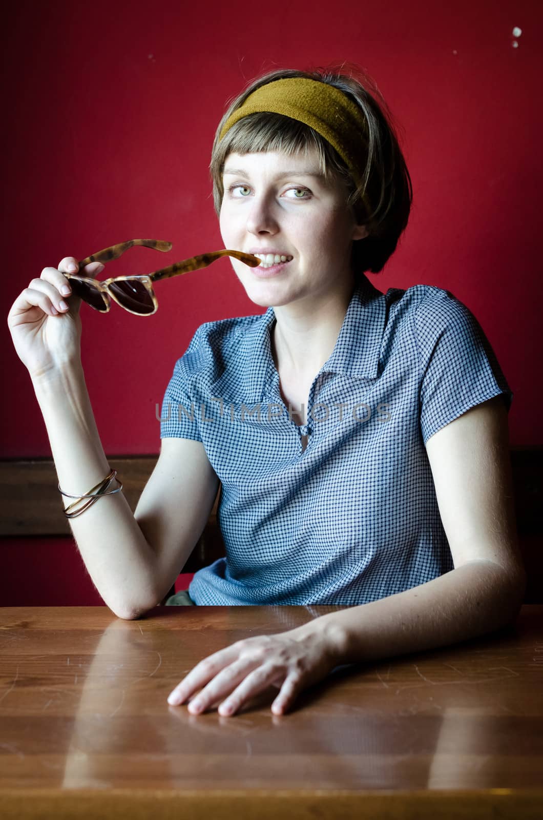 young beautiful hipster woman at the bar