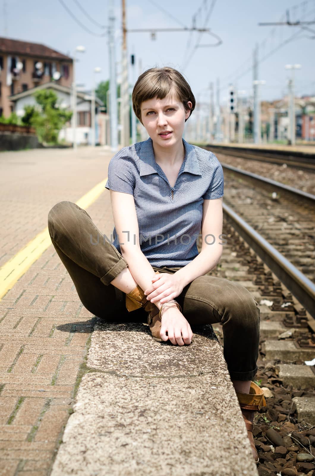 young beautiful hipster woman at the station