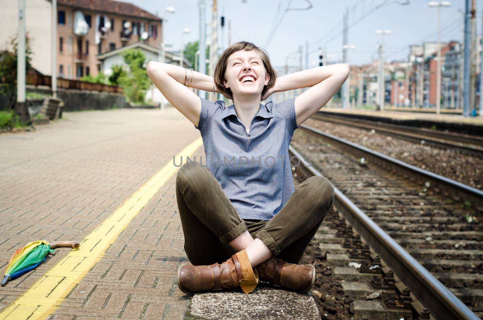 young beautiful hipster woman at the station