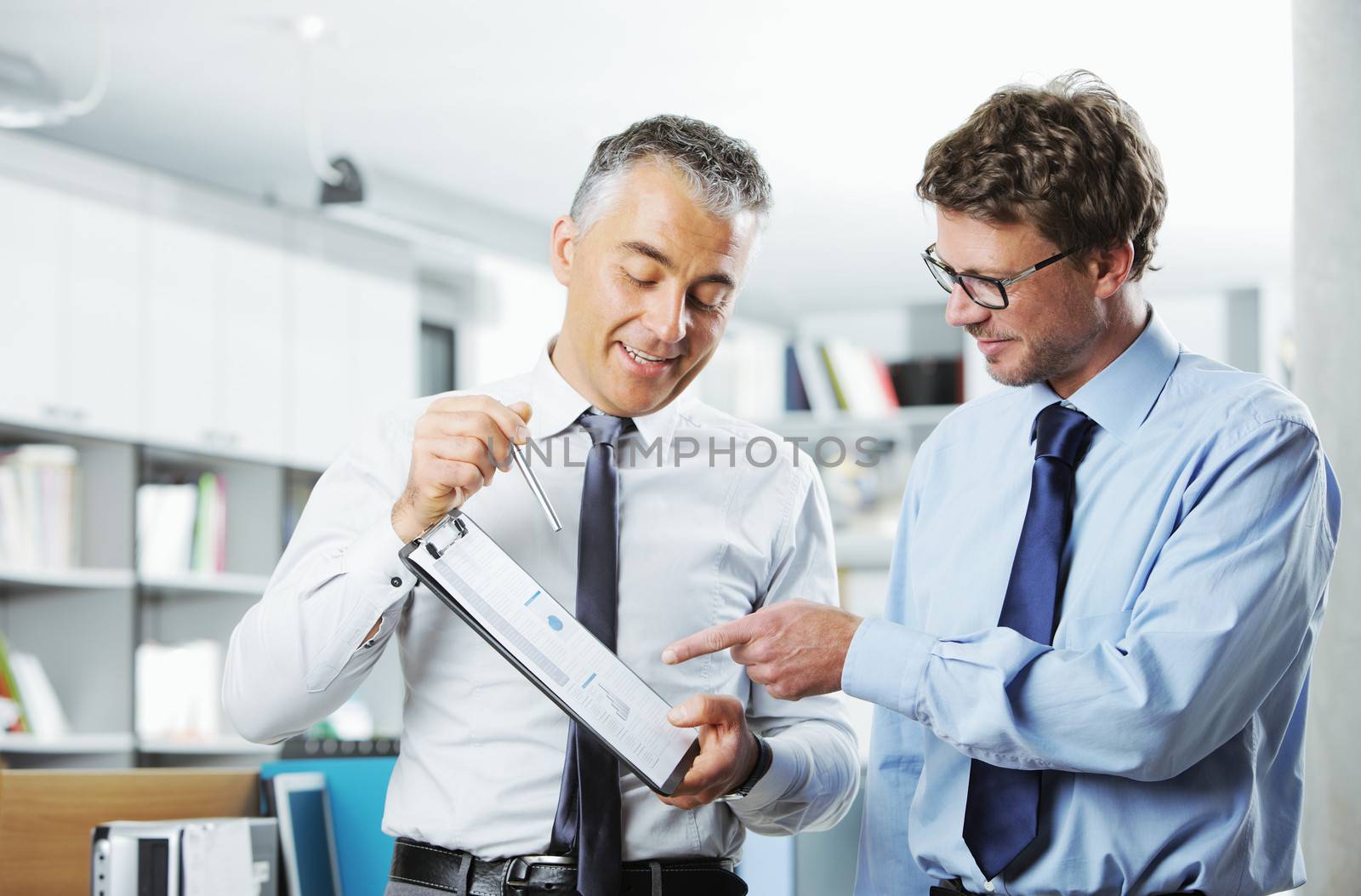 Business colleagues discussing together in an office
