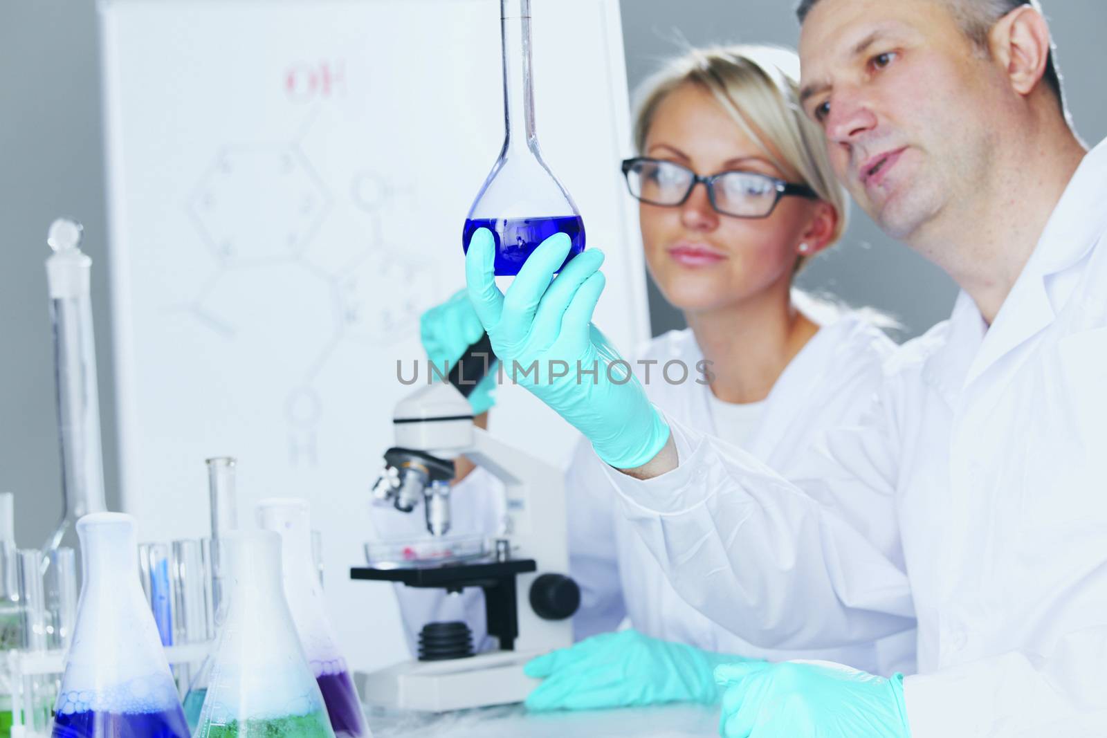 Chemistry Scientist conducting experiments in laboratory