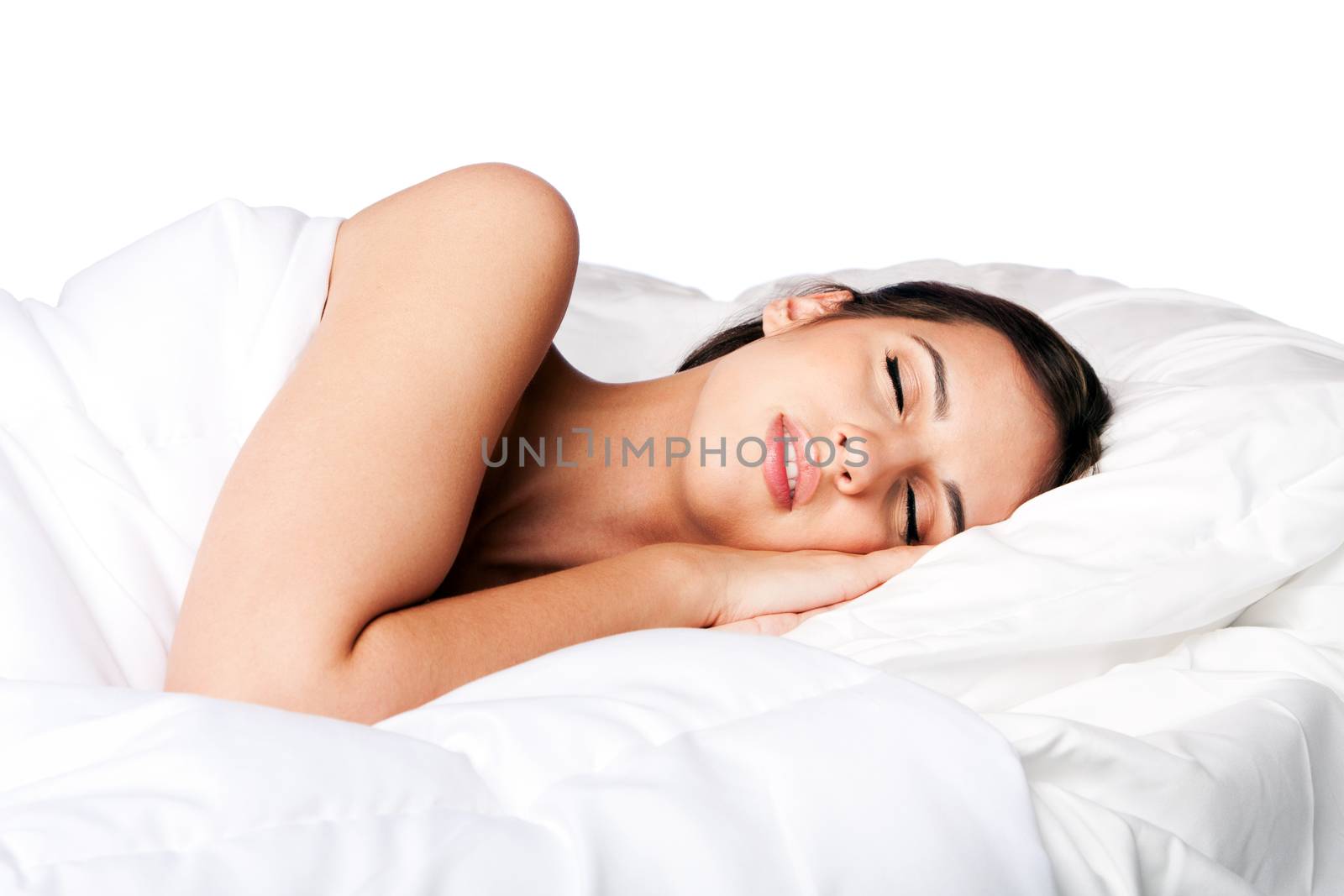 Woman happily beauty sleeping in white bed and dreaming, isolated.