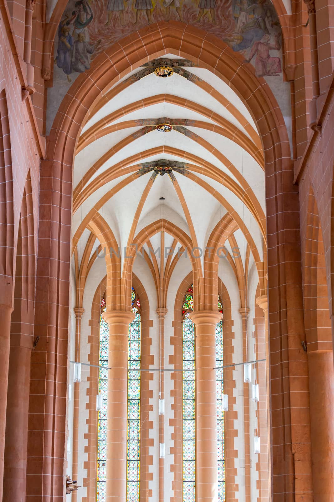 Arches and windows in old Church of Holy Spirit in ancient town city of Heidelberg Germany