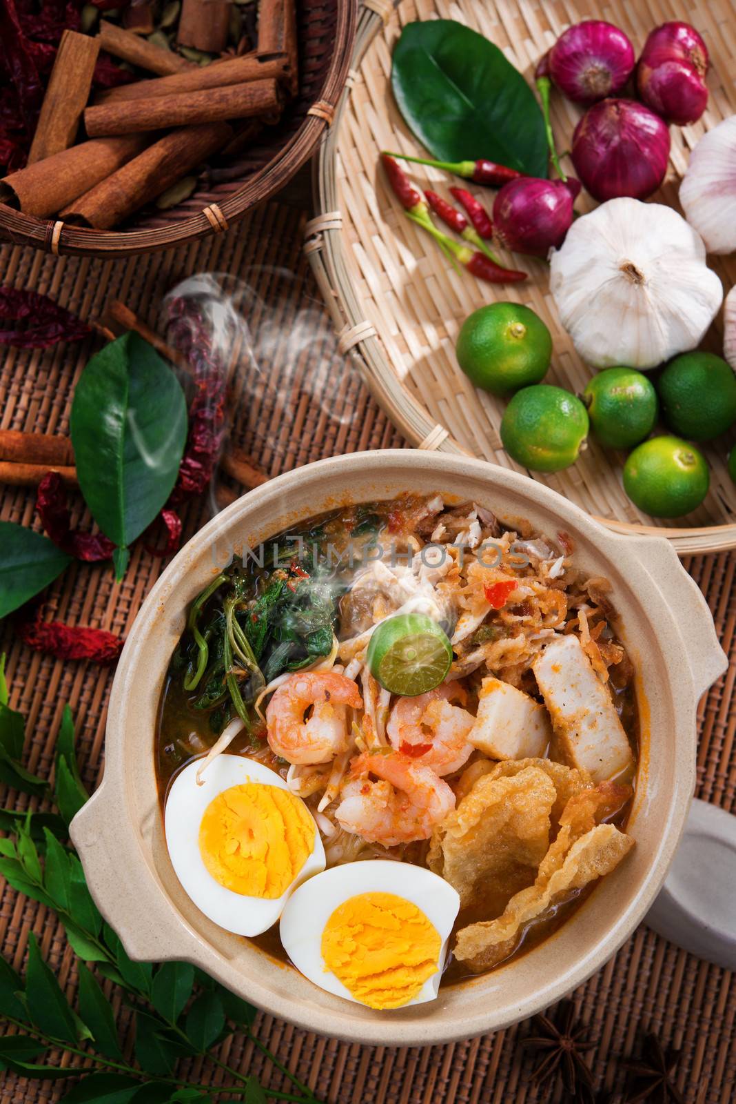 Prawn noodles, prawn mee. Famous Malaysian food har mee spicy fresh cooked in clay pot with hot steam.