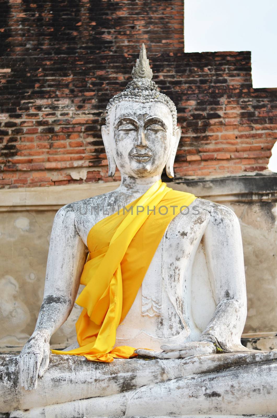 Ancient Buddha statues at Wat Yai Chai Mongkol in Ayutthaya by siraanamwong