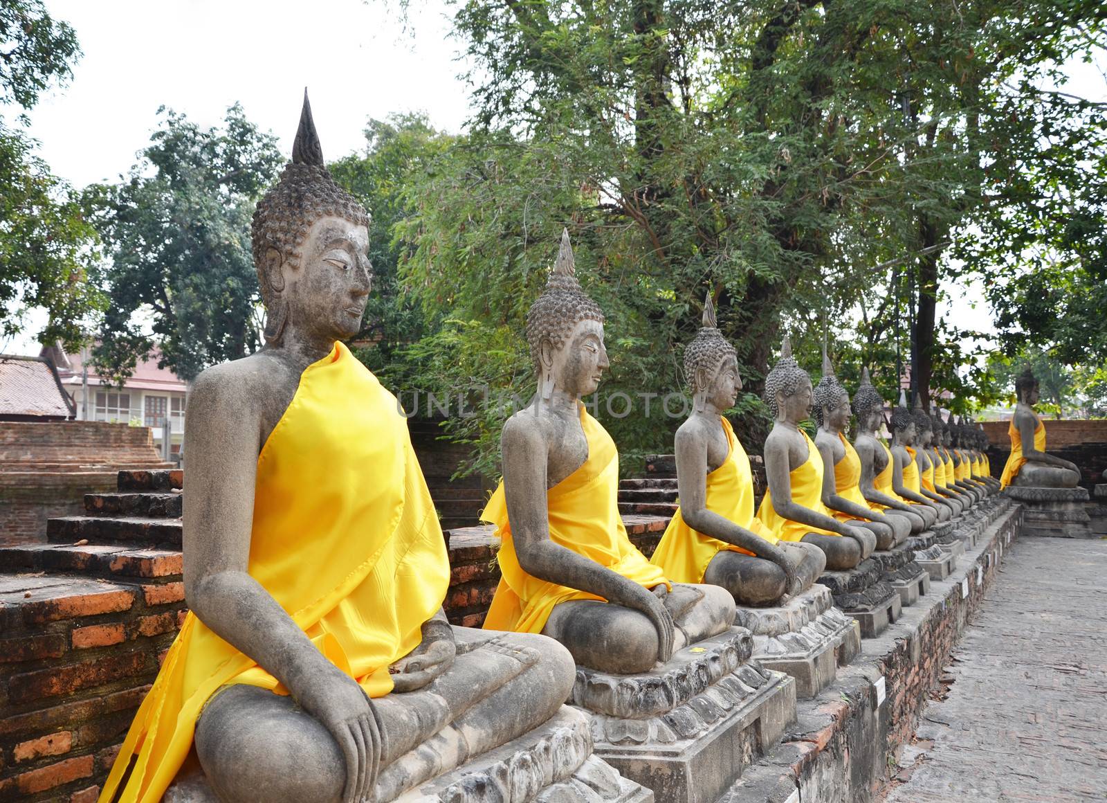 Ancient Buddha statues at Wat Yai Chai Mongkol in Ayutthaya, Thailand 