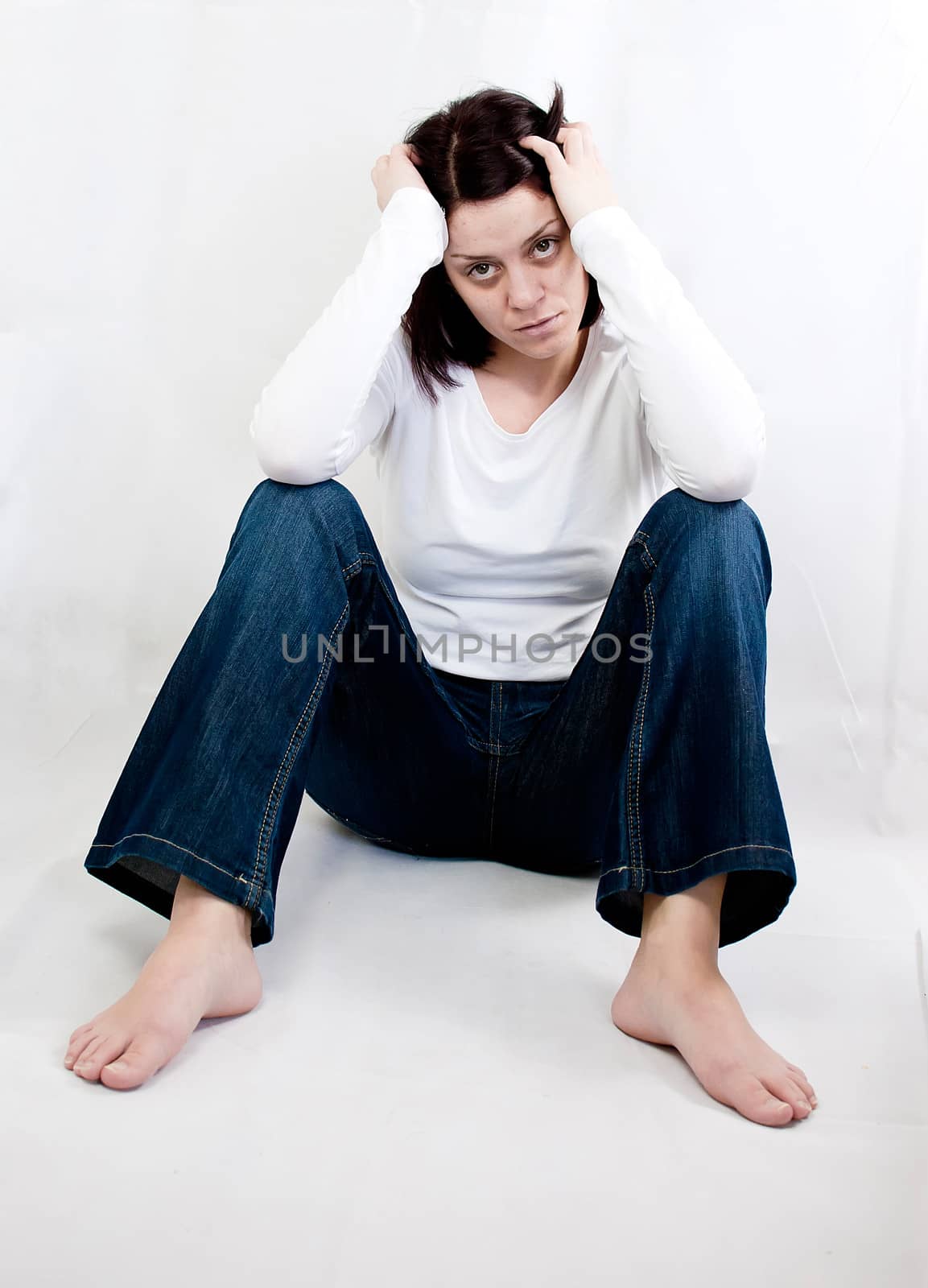 conceptual portrait of stressed abused young woman 