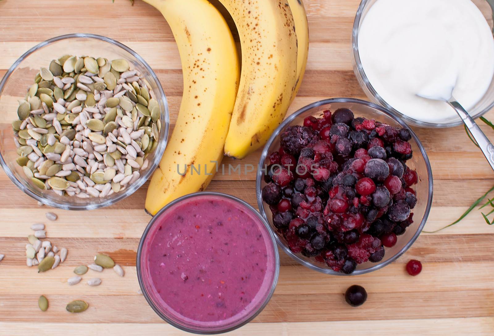 healthy berries juice smootie on wooden board