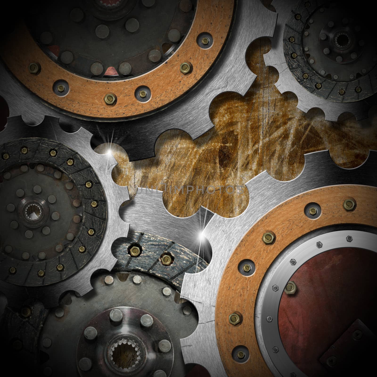 Mechanical template with metallic gears on brown grunge background

