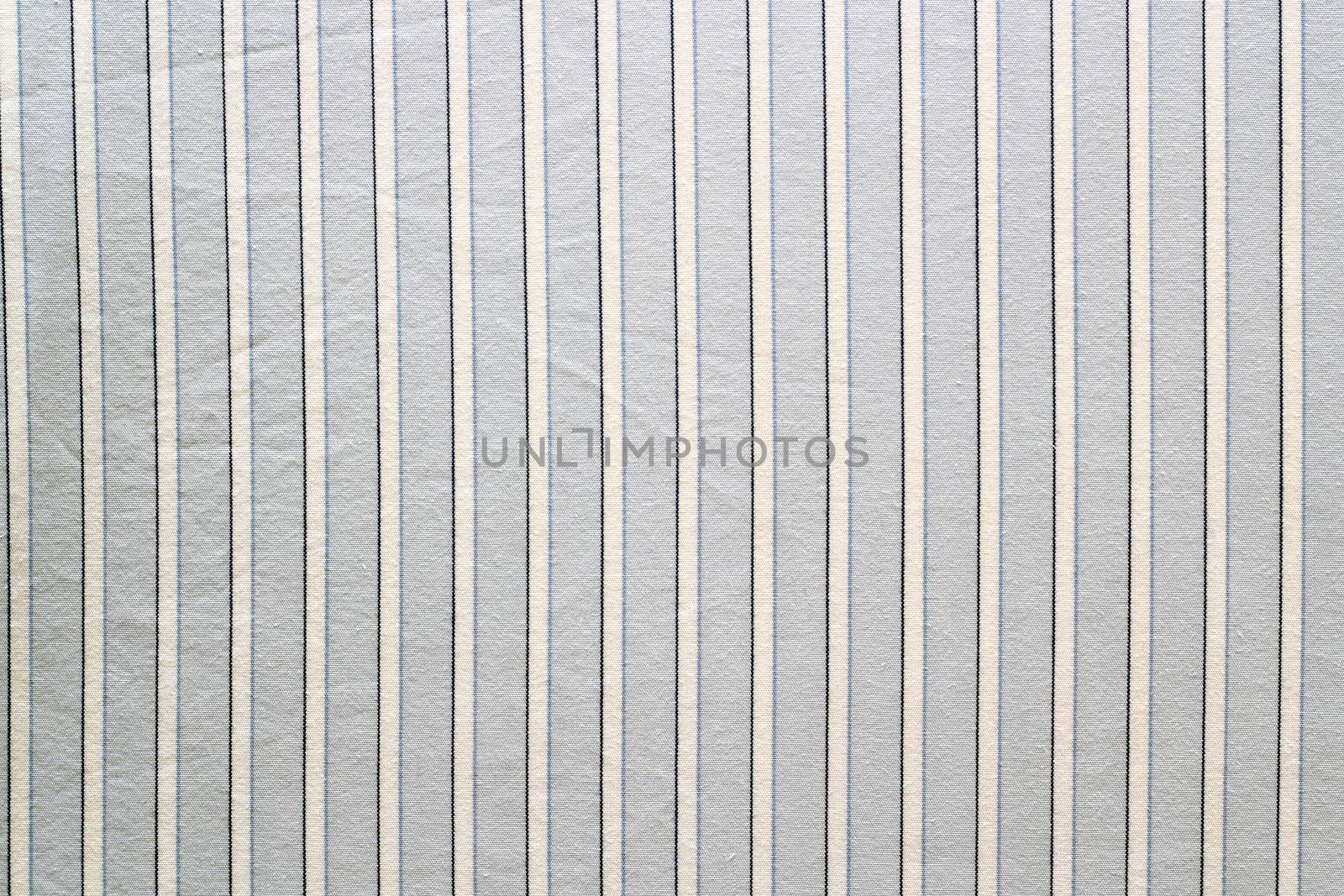 blue shirt fabric with parallel white lines 