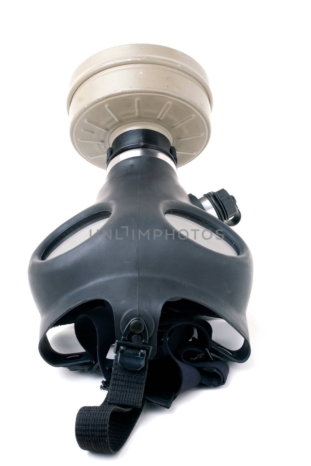 An old worn gas mask with black rubber isolated over white. 