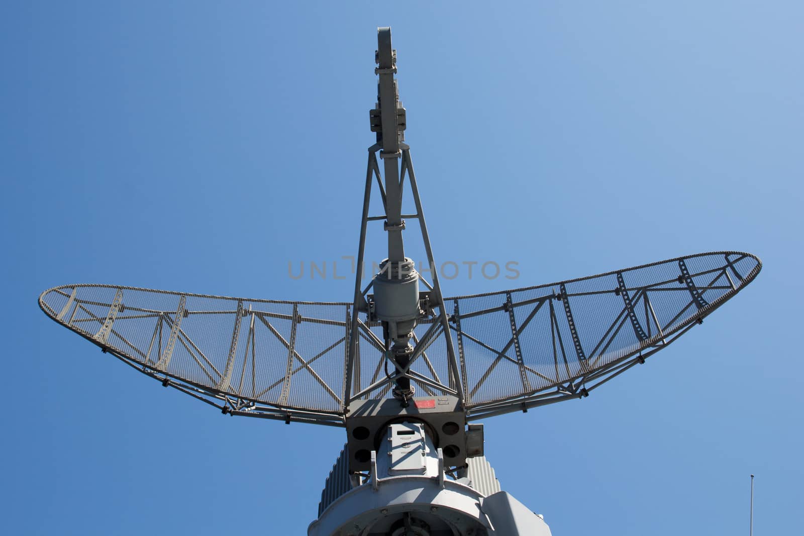  Modern military ship radar station against the sky