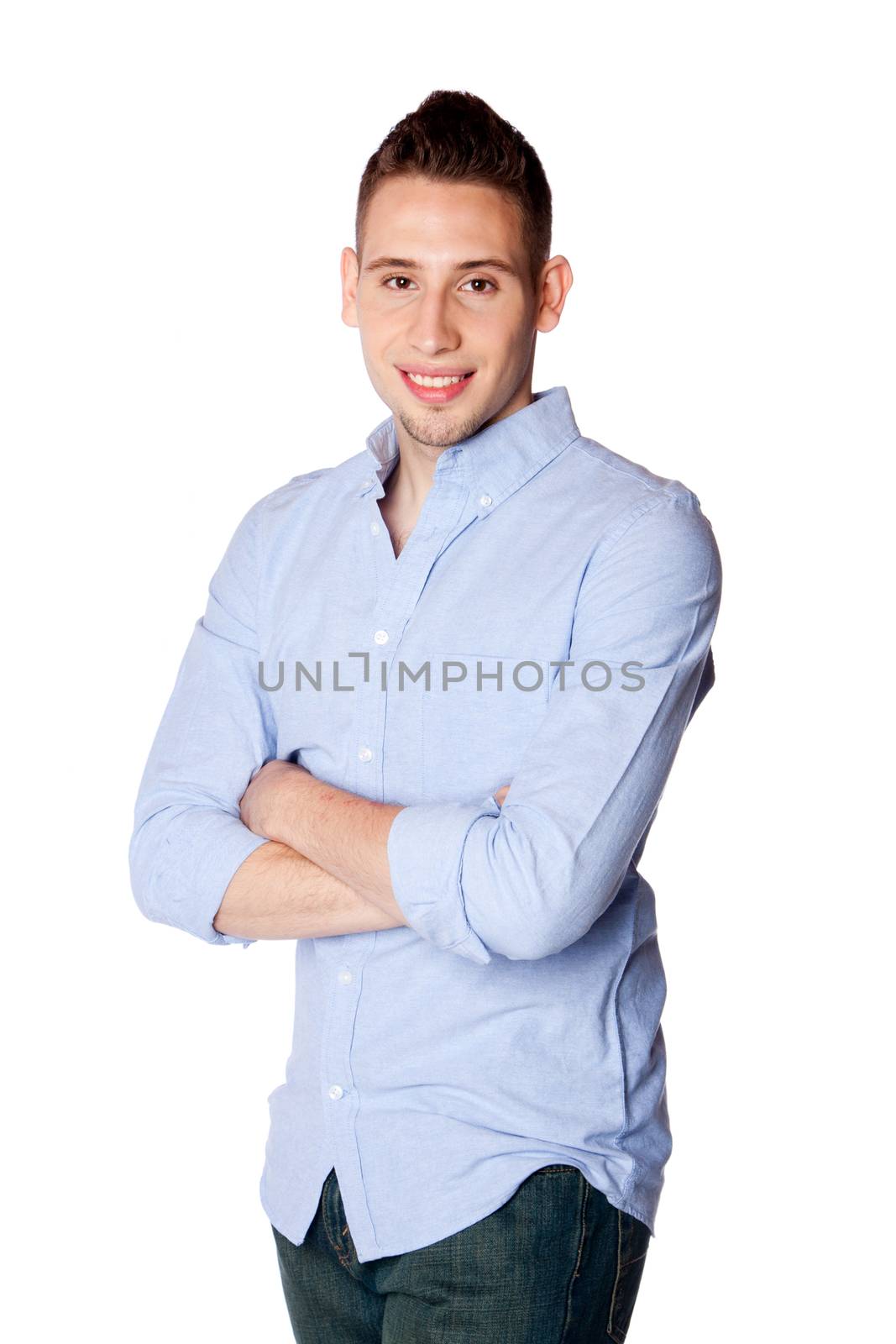 Happy smiling young male business entrepreneur professional dressed casual standing with arms crossed, isolated.