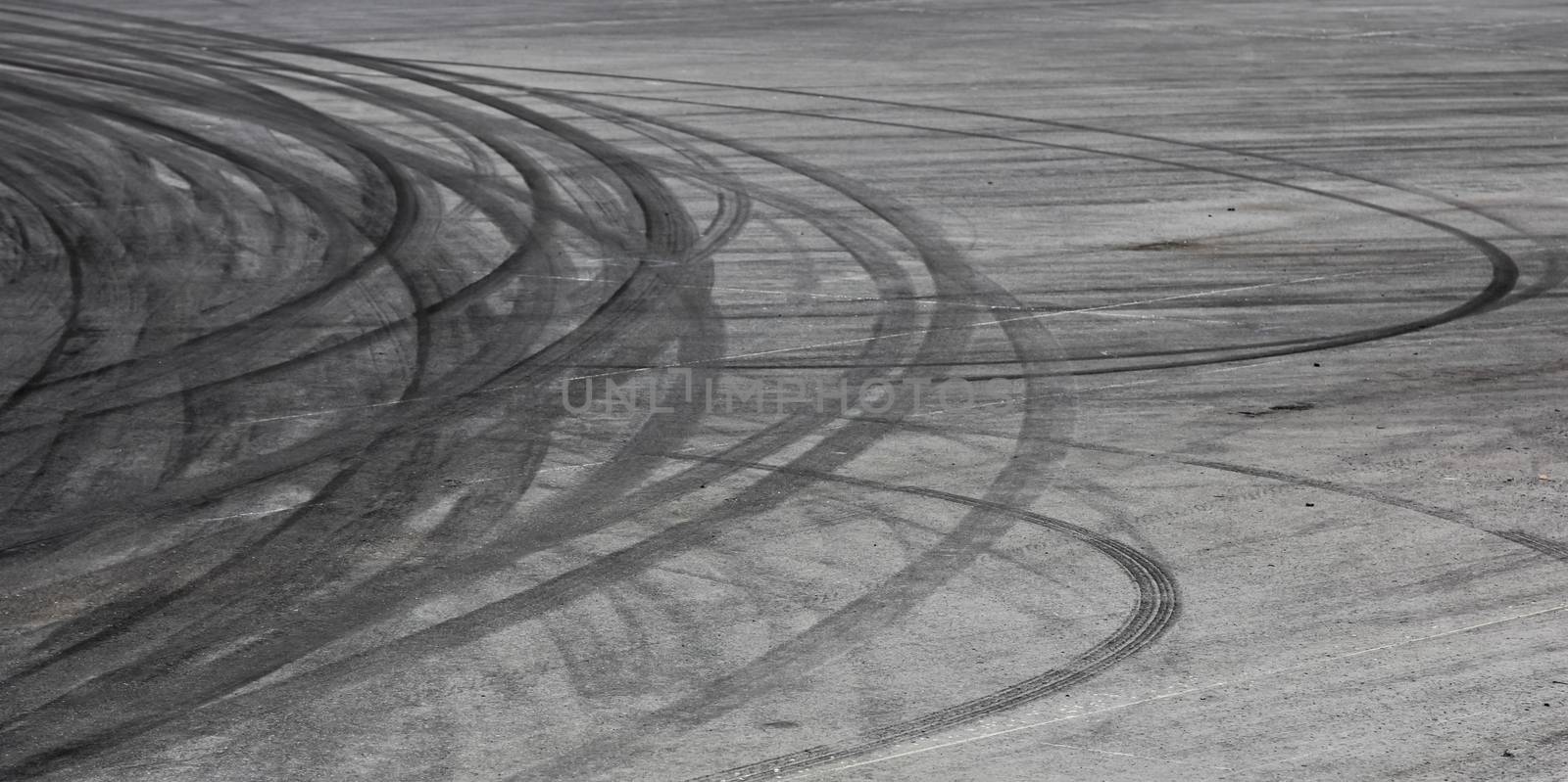 Background with tire marks on road track