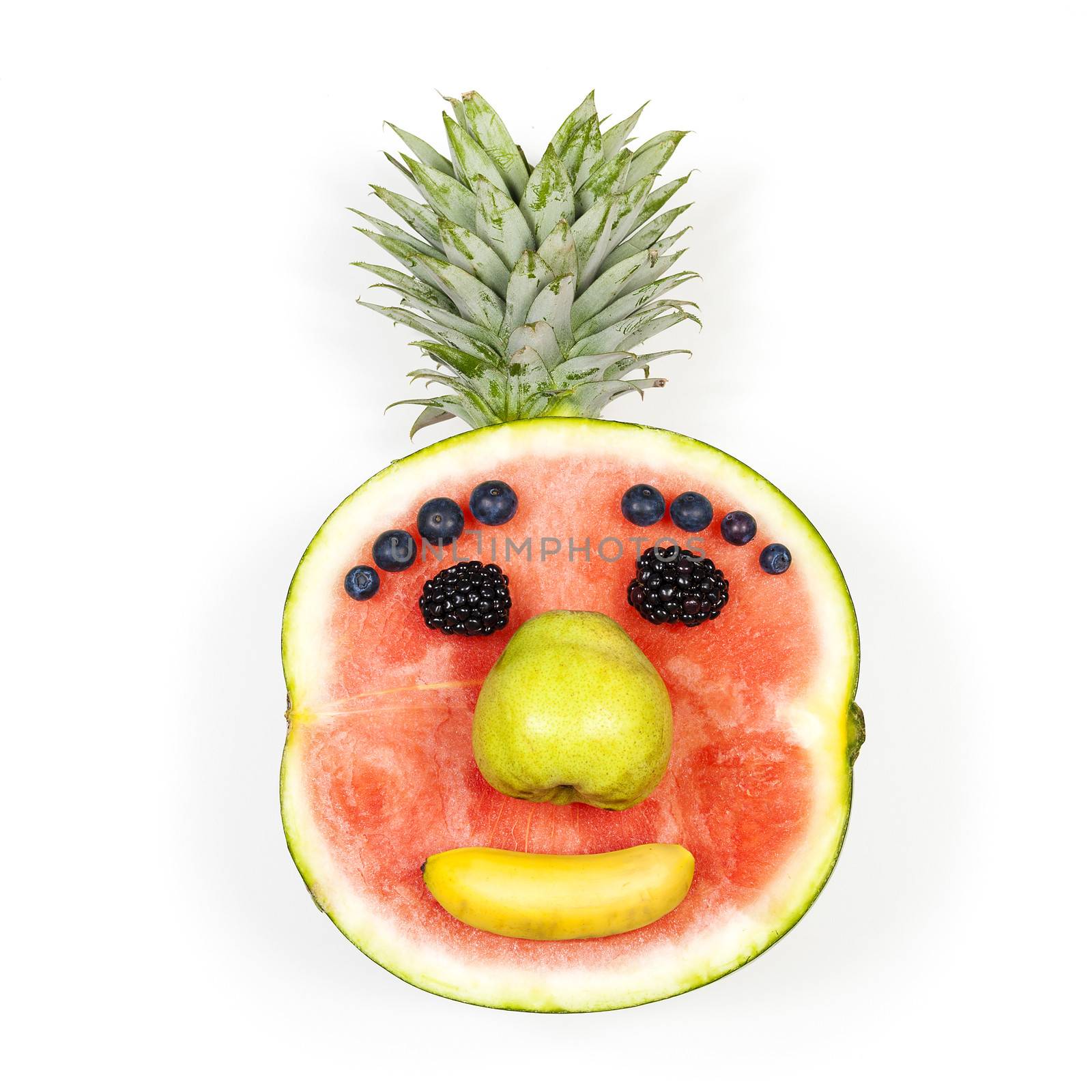 Funny fruit face isolated over white background 