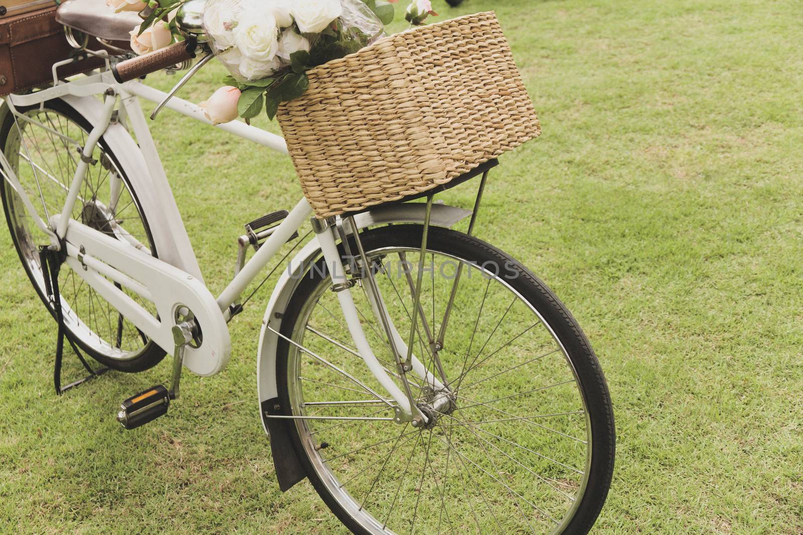 Vintage bicycle on the field by ponsulak