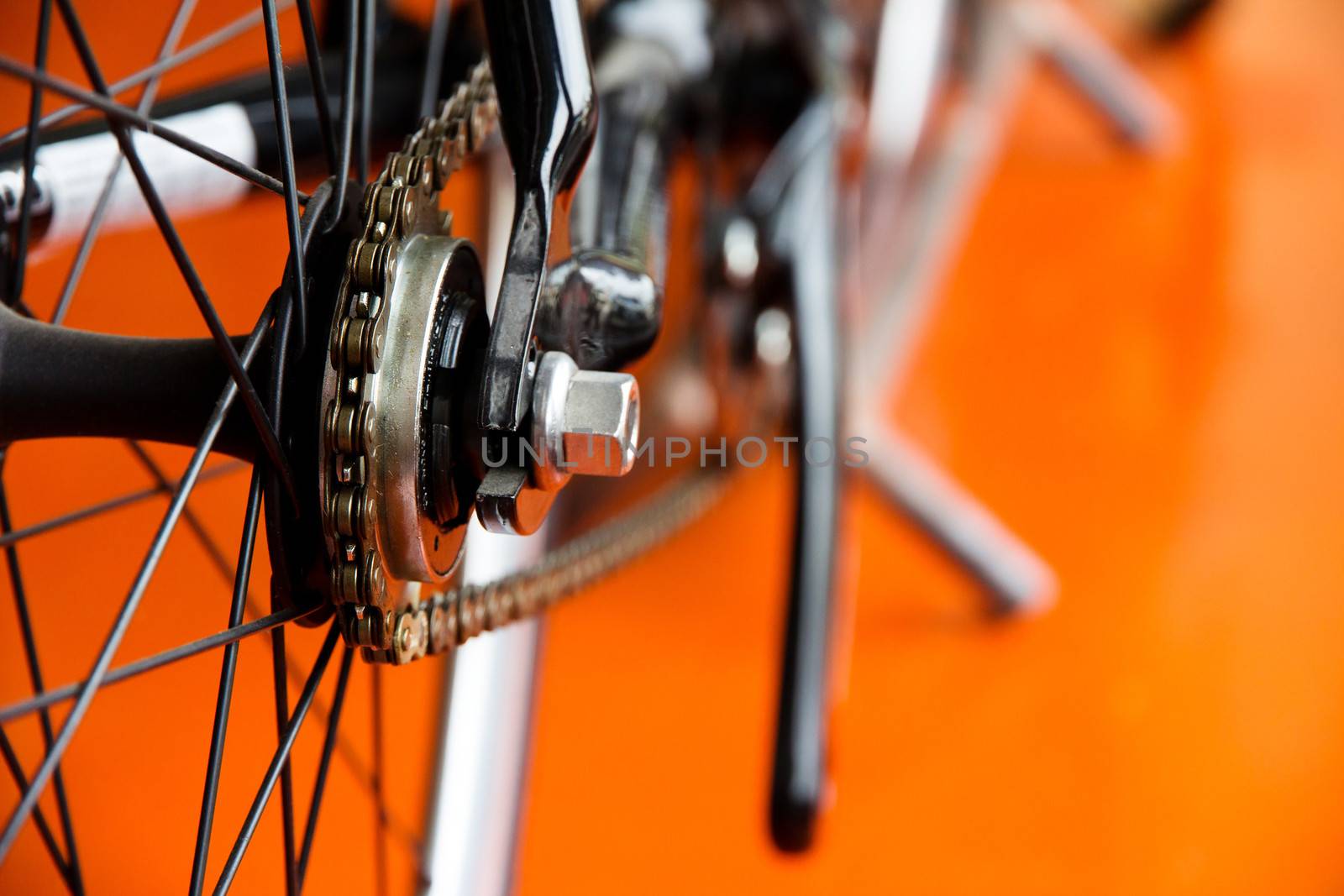 Low-down Shot of Bicycle Wheels and gearwheel by ponsulak