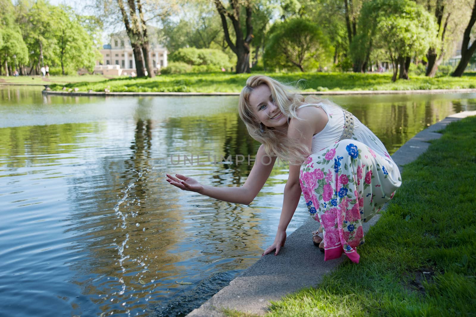 beautiful blonde near the water by raduga21