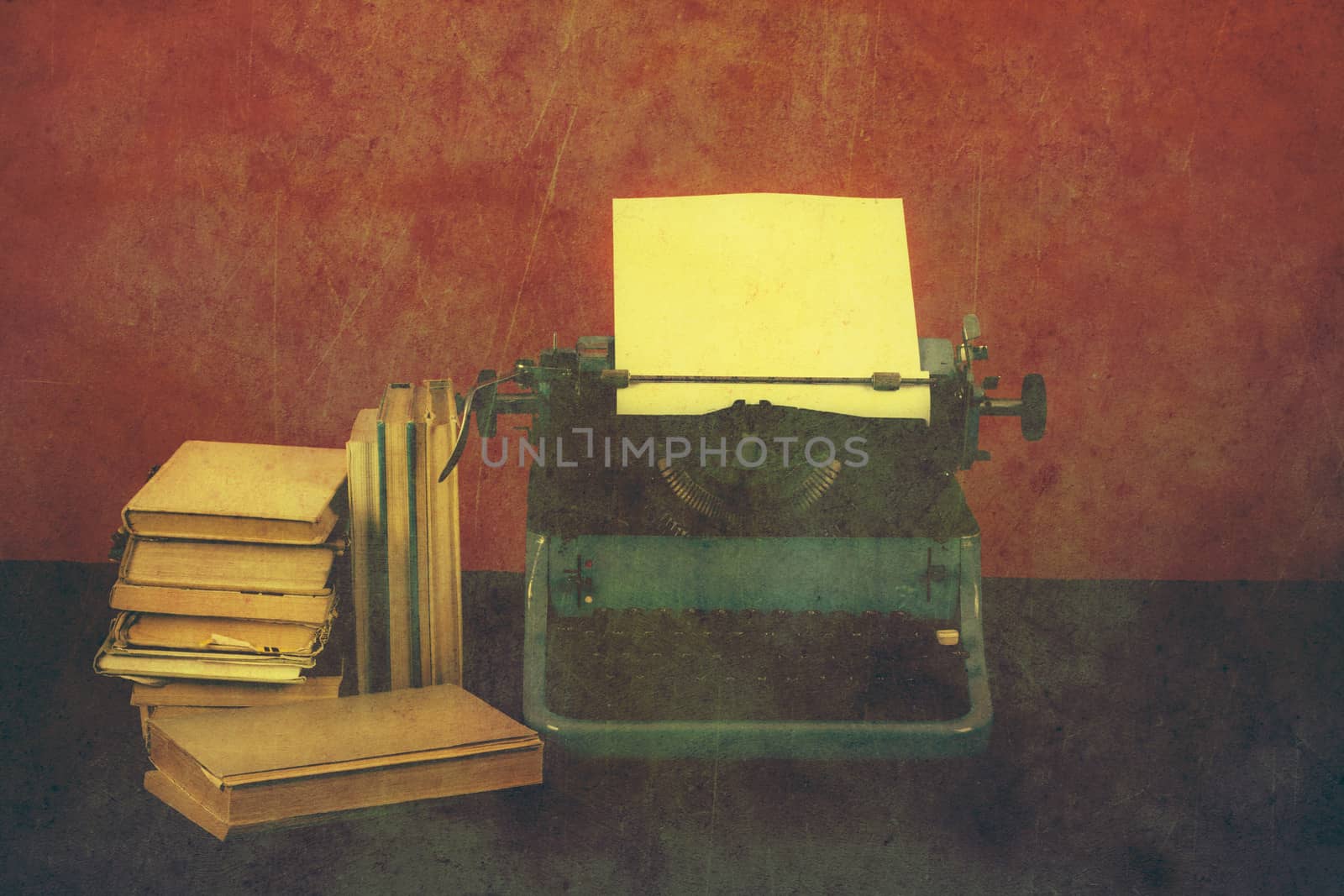Old typewriter with paper and books, retro colors on the desk