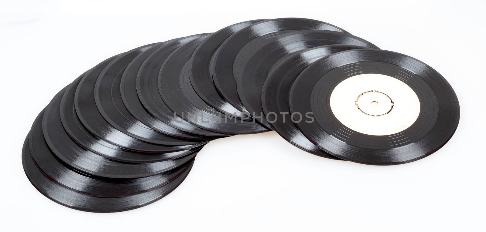group of old small black vinyl records 
