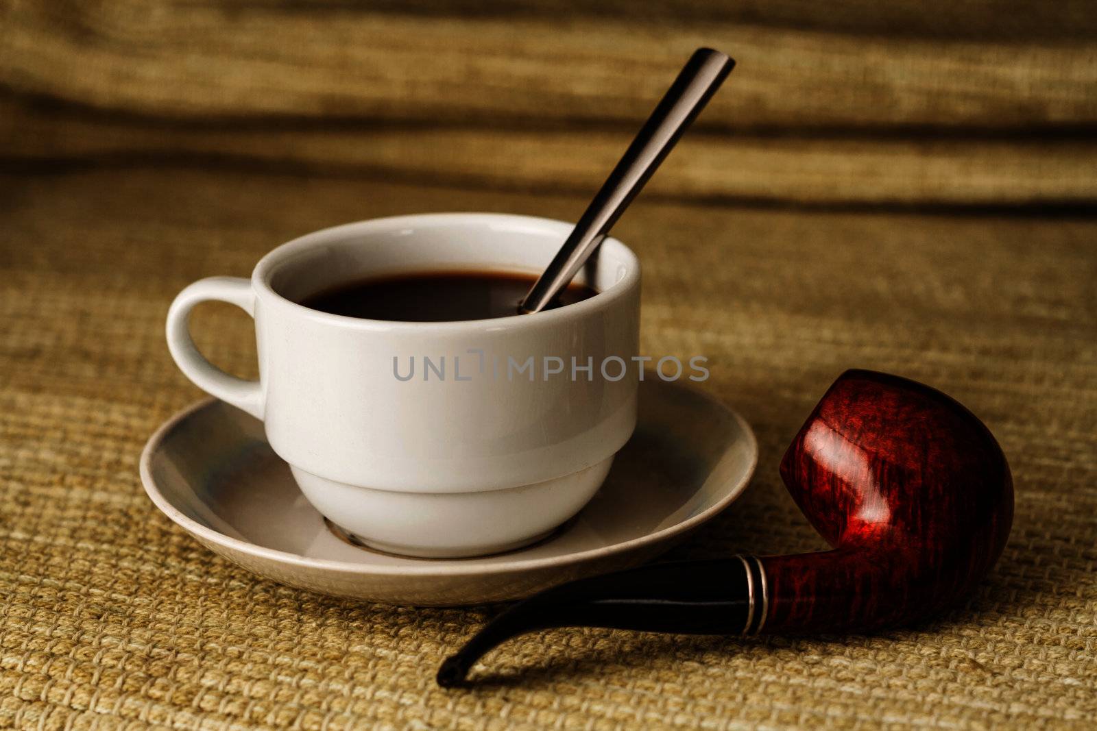 A cup of coffee with a pipe in high resolution