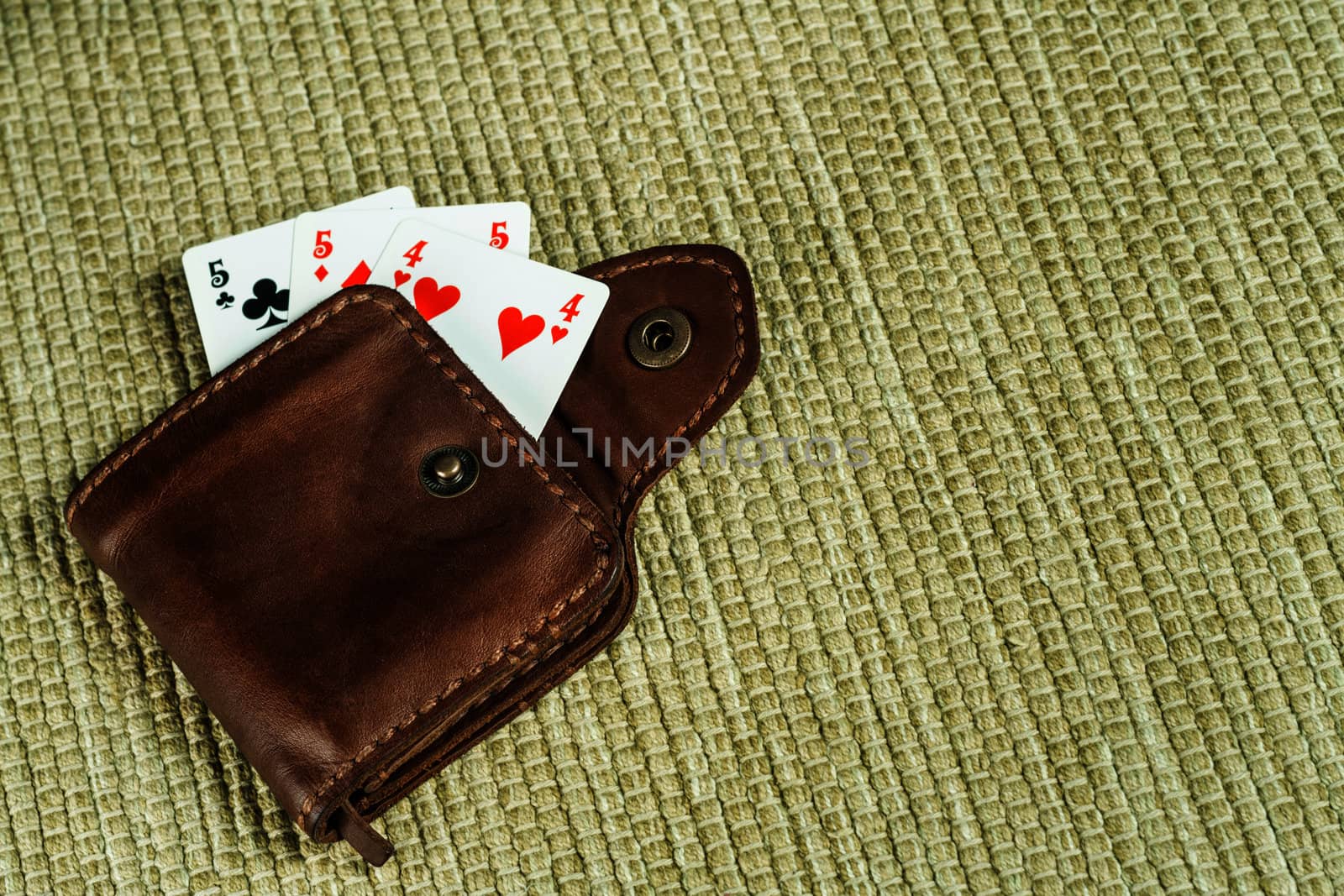 Purse made of leather and playing cards in high resolution
