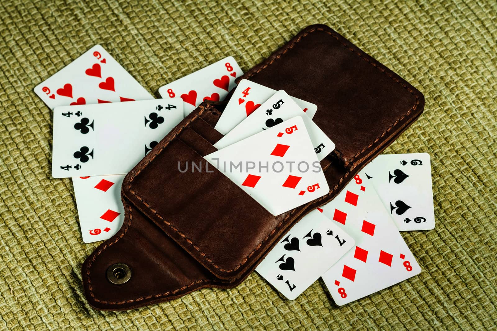 Purse made of leather and playing cards in high resolution