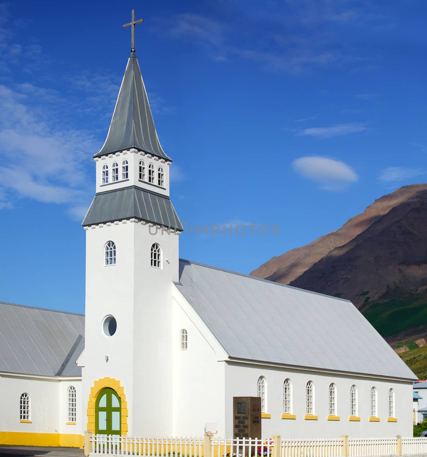 Small white church, Iceland. Summer day. Panorama