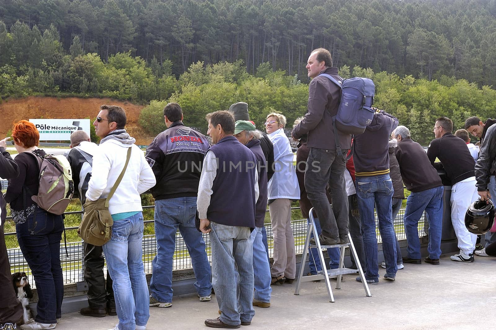 spectators of automobile race to the platform of the French Ale circuit in the Cevennes