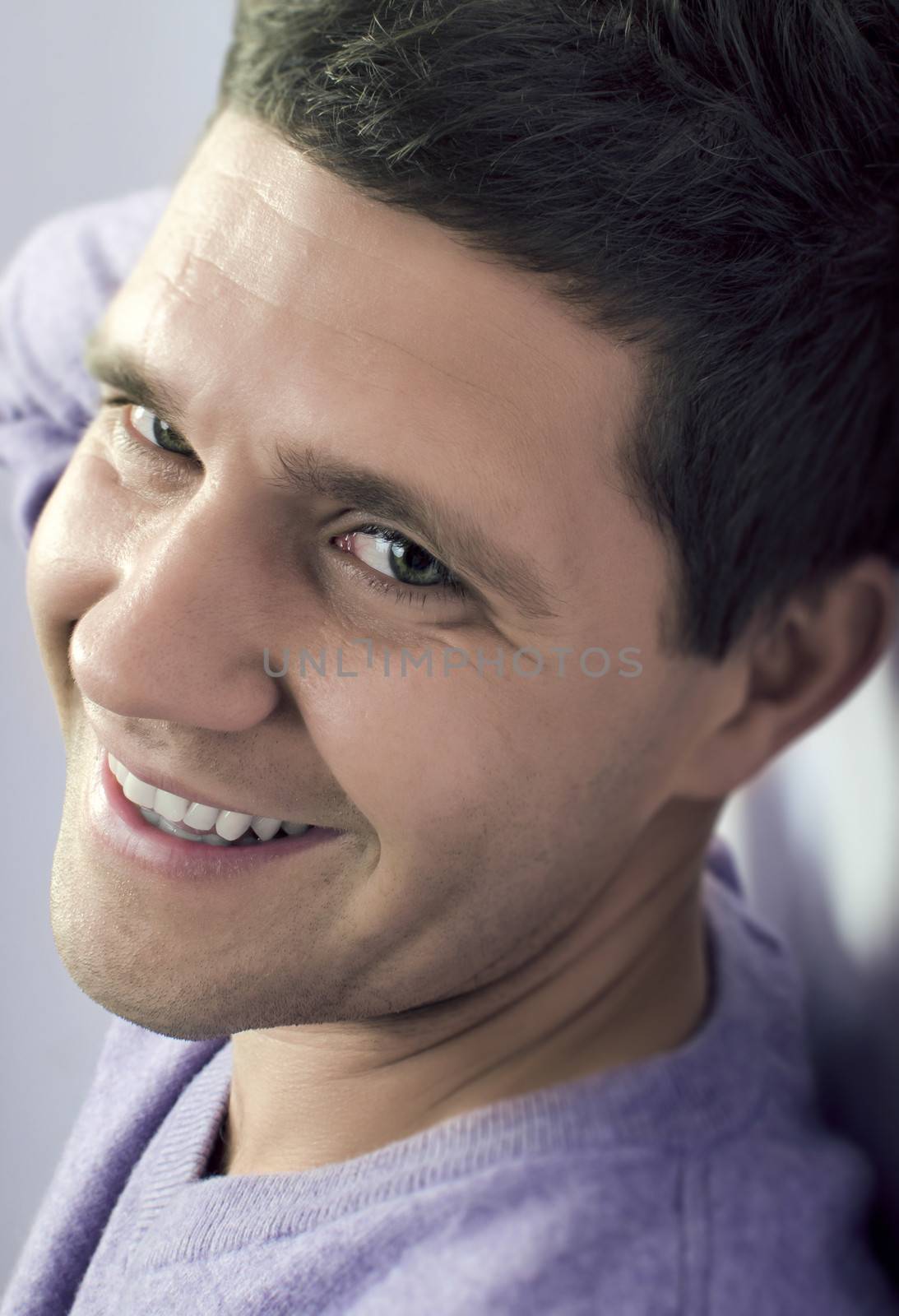 Young man portrait smilling at camera