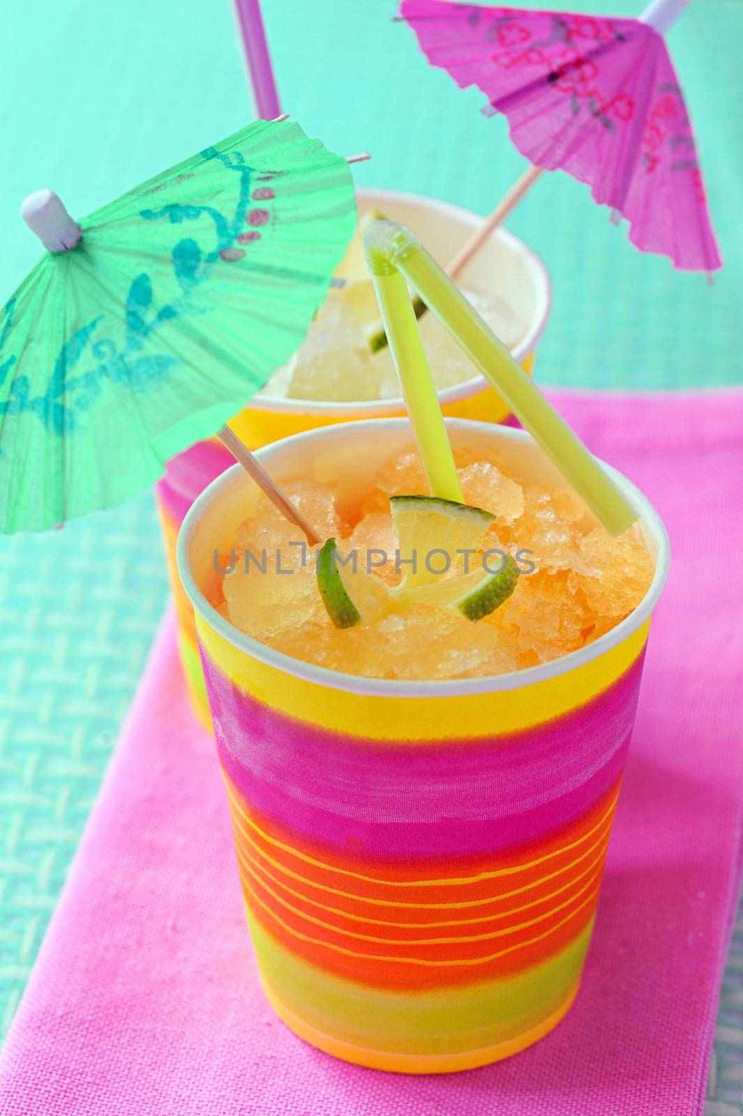 two glasses with cocktail and umbrellas shoot in studio