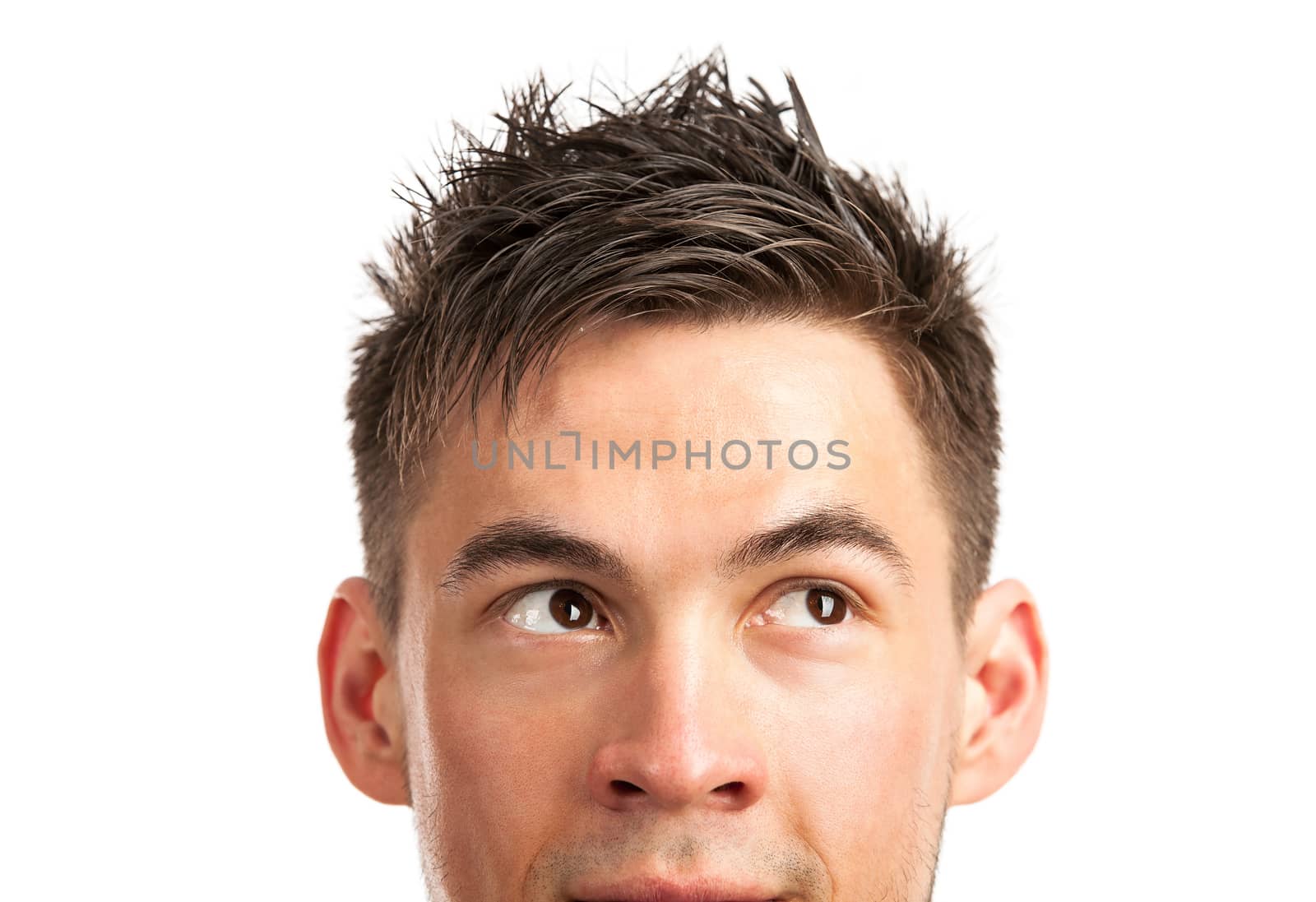 Closeup view of young man looking at corner