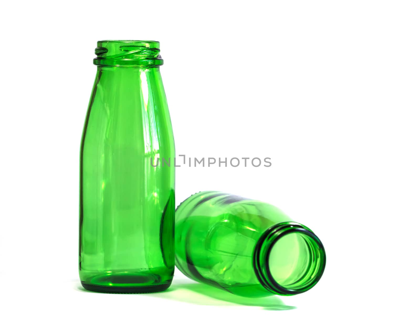Green Bottles on White Background, with focus on Left bottle by punpleng