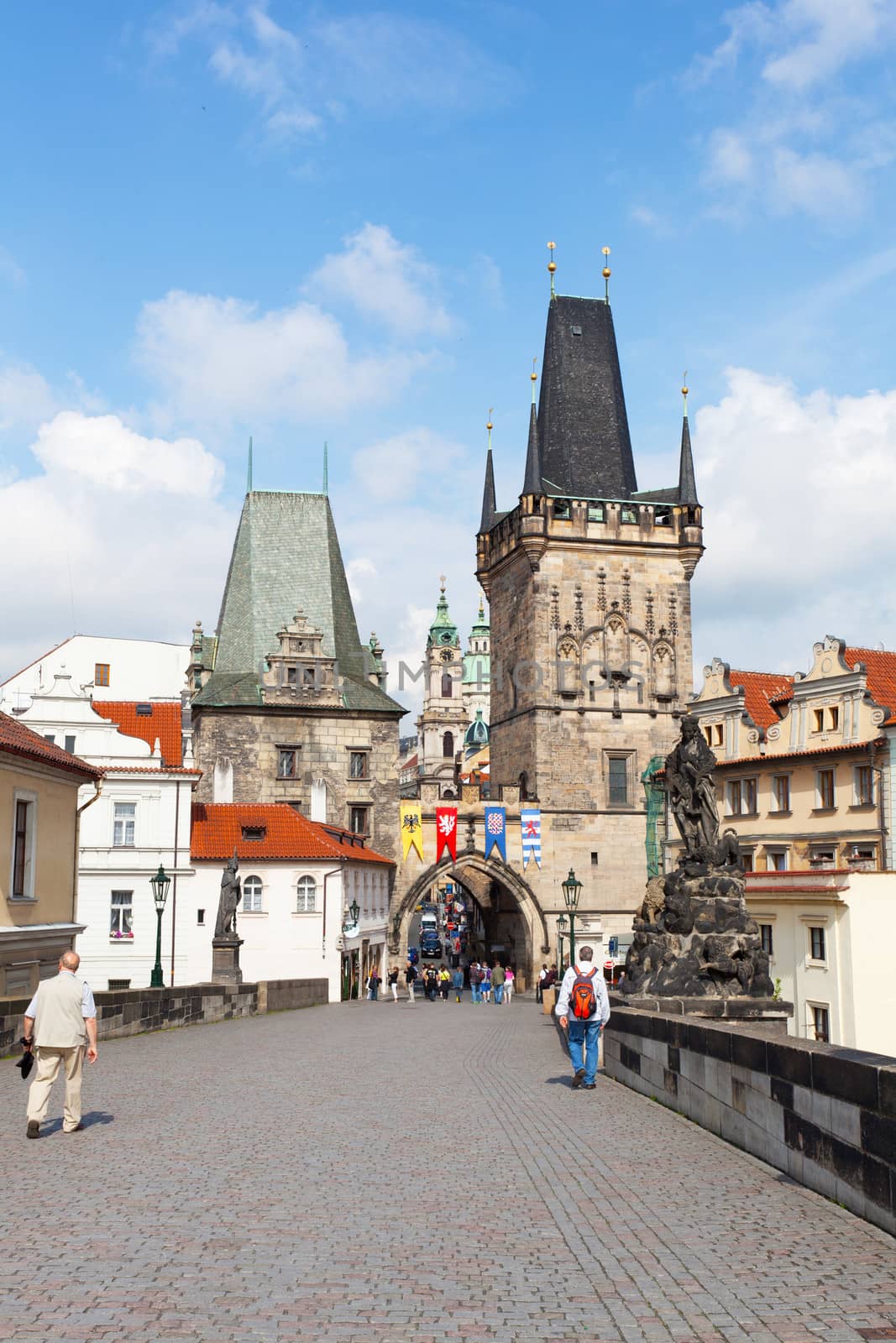 Tourists on Charles Bridge, June 11, 2012, Prague,Czech Republic. Annually Prague is visited by more than 3,5 million tourists.