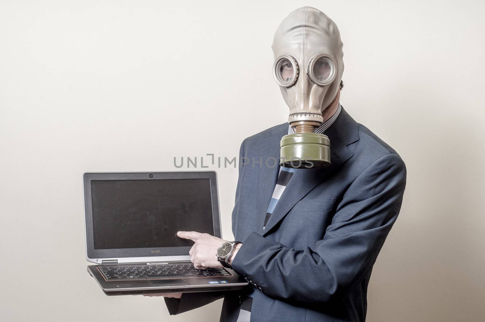 businessman with gas mask with notebook on gray background