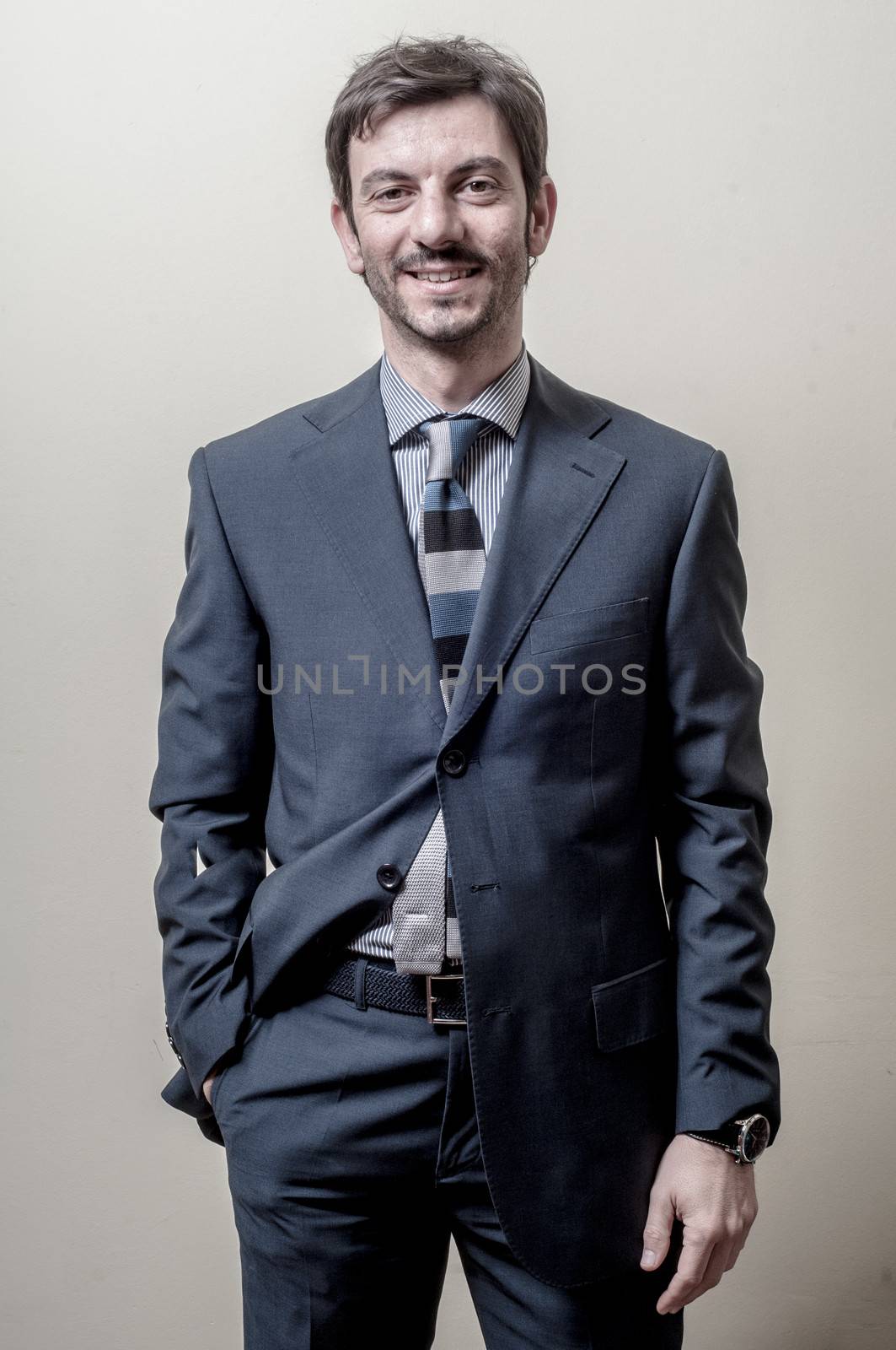 leader businessman isolated on gray background
