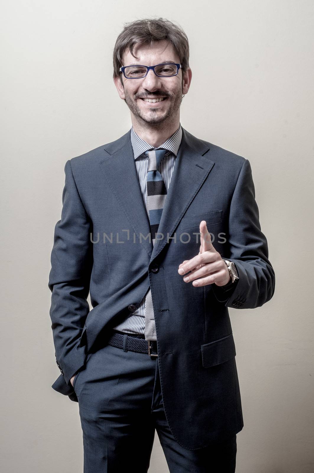 businessman with eyeglasses isolated on gray background