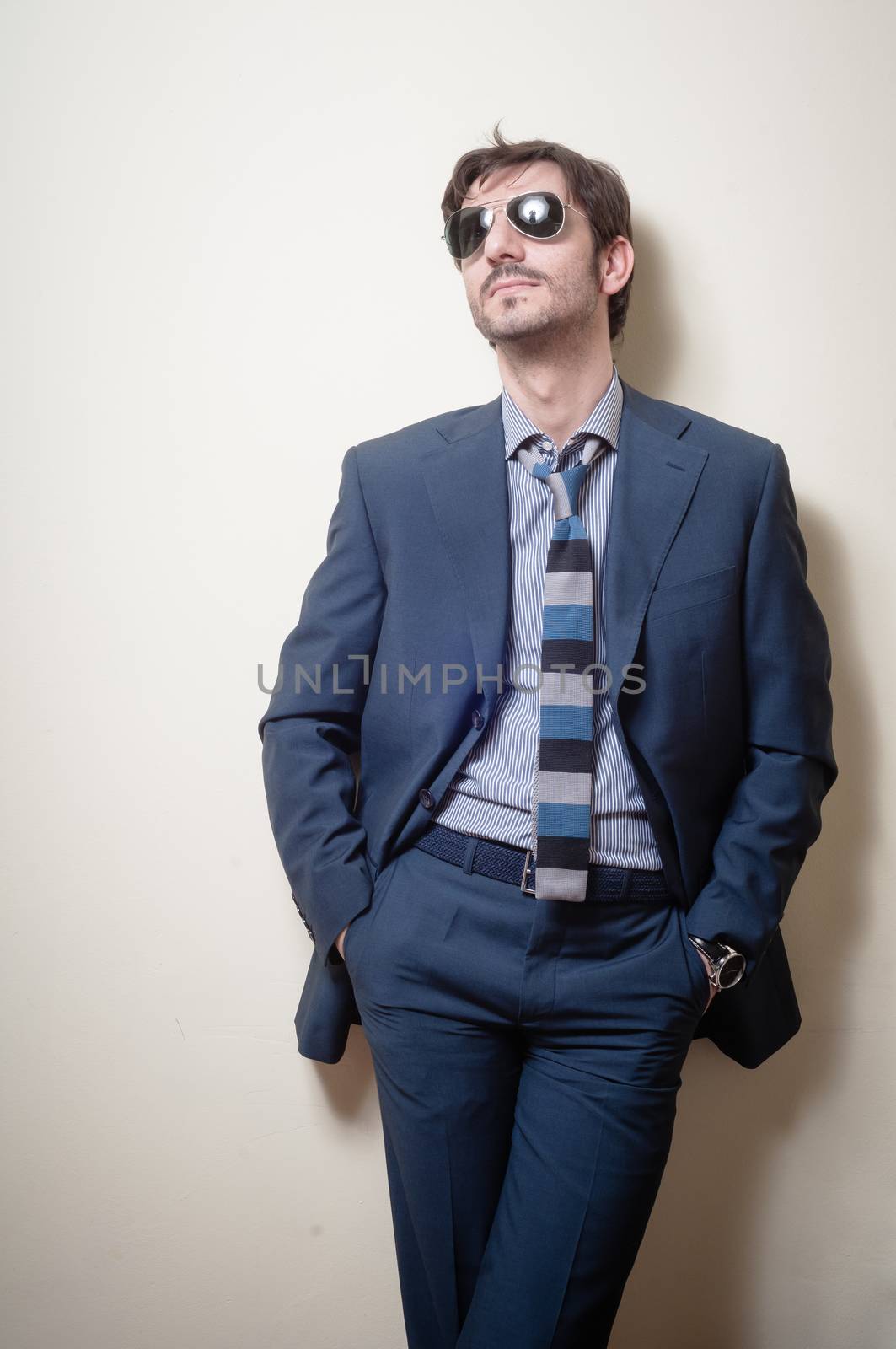 businessman stylish fashion posing elegant on gray background